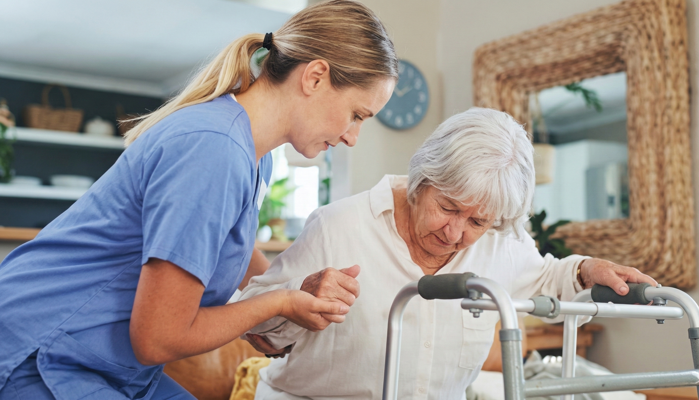 Care Attendant assisting elderly patient